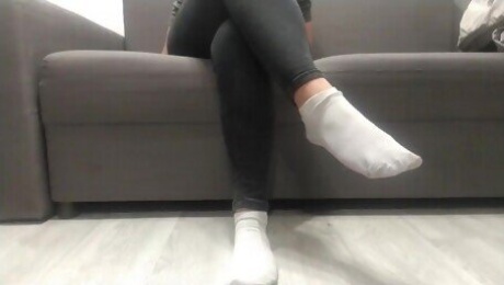 Monika Nylon shows her legs in white socks after a whole day of wearing them, and then shows only th
